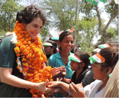 : Priyanka Vadra interacts with girl students during an election campaign for her mother and Congress President Sonia Gandhi in Raebareli on Friday. PTI Photo