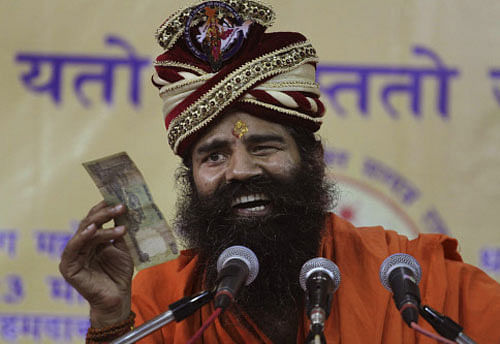 Ramdev booked, parties demand action for 'anti-dalit' remarks. AP Photo
