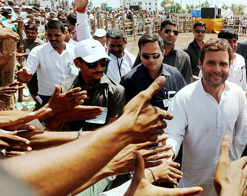 Congress Vice President Rahul Gandhi meets supporters during an election campaign rally in Botad, Gujarat on Saturday. PTI Photo