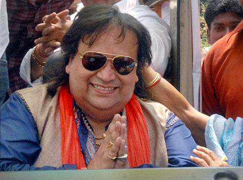 Singer and BJP candidate: Bappi Lahiri at a campaign  in Hooghly district of West Bengal on Friday. PTI