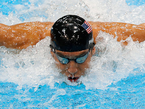 Michael Phelps rounded off his comeback to competitive swimming with a relaxed showing in his morning heat at the USA Grand Prix meet here on Friday. AP photo