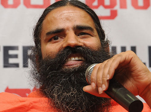 In the backdrop of yoga guru Ramdev's 'honeymoon' remark against Rahul Gandhi, the Election Commission has come out with fresh guidelines barring people from making 'malicious' statements about the private life of individuals and said those violating the directive would not be allowed to hold programmes during polls. Photo courtesy: Election Commission website, http://eci.nic.in/eci/eci.html