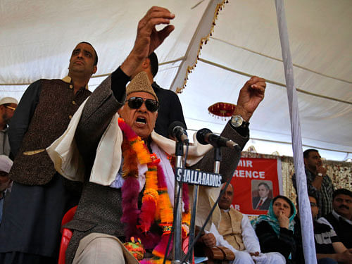 Jammu-Kashmir state's governing National Conference party leader Farooq Abdullah, speaks at a campaign rally ahead of elections in Srinagar, Sunday, April 27, 2014.