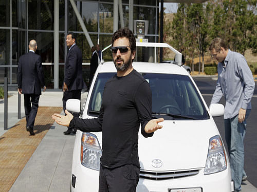 Google says its self-driving cars are motoring along: they can navigate freeways comfortably, albeit with a driver ready to take control. AP file photo
