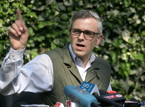 Hitting back at BJP's prime ministerial candidate Narendra Modi, Jammu and Kashmir Chief Minister Omar Abdullah said on Monday that Kashmiri Pandits (KPs) did not leave the Valley during his father Farooq Abdullah's regime ''but because of BJP and its partners.'' PTI