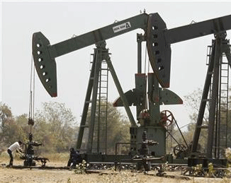 The growth rate of eight core sector industries decelerated to 2.6 per cent in 2013-14, the lowest in almost a decade, due to a decline in crude oil and natural gas production. Reuters photo