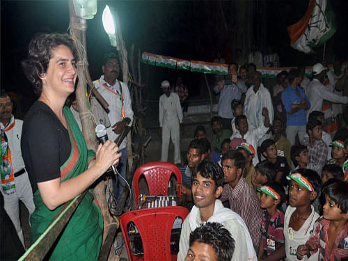 'I am Rajiv Gandhi's daughter,' was Priyanka Gandhi terse reply today to purported comments by Narendra Modi that he considers her as his daughter. PTI photo