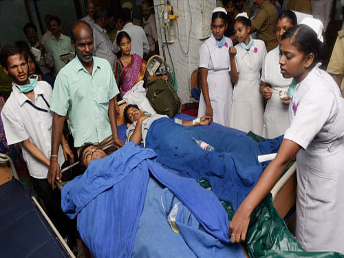 Injured passengers being shifted to a hospital after bomb blasts in the two coaches of a train in Chennai on Thursday. PTI Photo