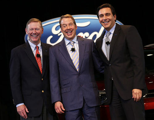 Ford Motor on Thursday announced that Alan Mulally will step down as chief executive on July 1, and named chief operating officer Mark Fields to replace him.
