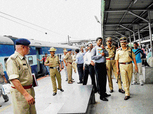 The Tamil Nadu police inspect the City Railway station on Friday. KPN