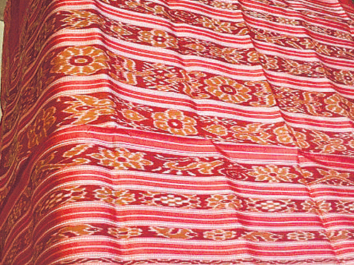 An exotic handloom silk sari of Odisha that embraces Lord Jagannath is the Khandua sari.
