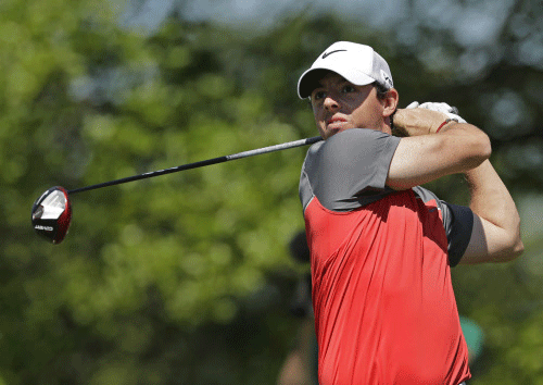 Rory McIlroy, of Northern Ireland, watches his tee shot on the 16th hole during the third round of the Wells Fargo Championship golf tournament in Charlotte, N.C., Saturday, May 3, 2014. AP photo