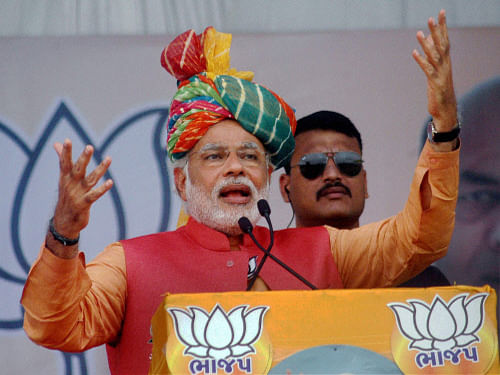 Complaining of booth rigging in West Bengal, Bihar and western Uttar Pradesh, Narendra Modi today alleged that the Election Commission was not acting impartially and dared it to take action against him. PTI file photo