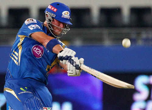 Corey Anderson of the Mumbai Indians plays a shot during an IPL 7 match against Chennai Superkings in Dubai. PTI photo