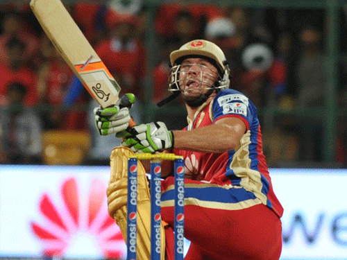 AB de Villiers of Royal Challengers Bangalore hit a six against Sunrisers Hyderabad in IPL match in Bangalore on Sunday. DHNS/PHOTO Kishor Kumar Bolar