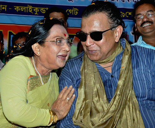 Bollywood actor and TMC MP Mithun Chakraborty with veteran actress and TMC candidate Sandhya Roy during her election campaign rally. PTI Image
