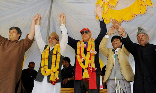 Jammu and Kashmir National Conference (NC) President Farooq Abdullah with senior party leaders during an election campaign rally at Pattan in Baramulla district , on Sunday. PTI Photo