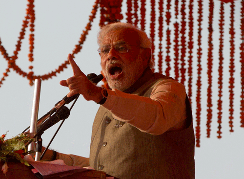 BJP prime ministerial candidate Narendra Modi speaks duirng rally. AP Photo