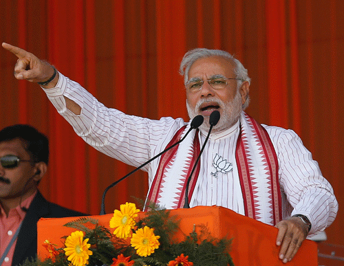 BJP's prime ministerial candidate Narendra Modi Monday said the SP, the BSP and the Congress might fight elections against one another in Uttar Pradesh, but they are all friends in Delhi. Reuters File Photo