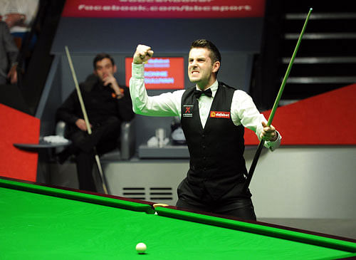 English pro Mark Selby played the match of his career to stun defending champion Ronnie O'Sullivan and pocket his maiden World Snooker Championship title here on Monday. / AP Photo