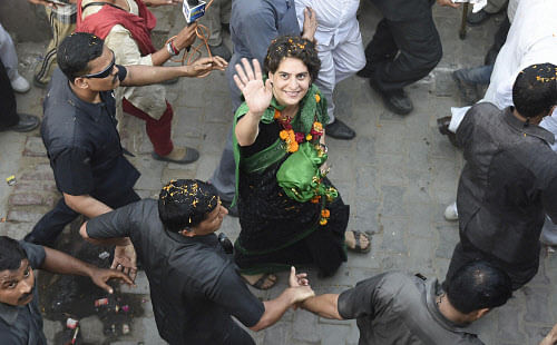 Priyanka Vadra during a road show in Jayas, Amethi on Sunday. PTI Photo
