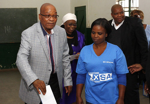 South African president and leader of the African National Congress (ANC), Jacob Zuma, casts his vote in Ntolwane, rural KwaZulu Natal province, South Africa, Wednesday, May 7, 2014. South Africans voted Wednesday in elections that are expected to see the ruling African National Congress return to power despite a vigorous challenge from opposition parties seeking to capitalize on discontent with corruption and economic inequality. AP Photo