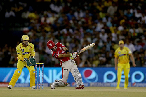 Kings XI Punjab's batsman Glen Maxwell hits a six against Chennai Super Kings during the IPL 7 match at the Barabati Stadium in Cuttack on Wednesday. PTI Photo
