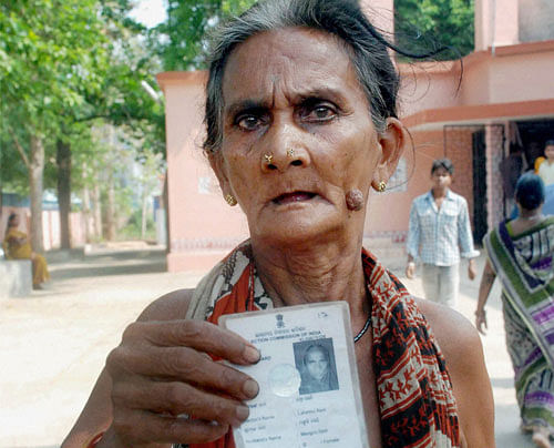 In a move to weed out bogus ration cards and fake beneficiaries, the Food and Civil Supplies Department has made it mandatory for all ration cards holders in the State to register their Elector's Photo Identity Card (EPIC) number and also that of the adult members of their families with the department. DH photo