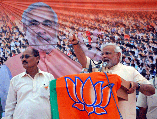 BJP's PM candidate Narendra Modi addressing an election rally in Azamgarh on Thursday. PTI Photo