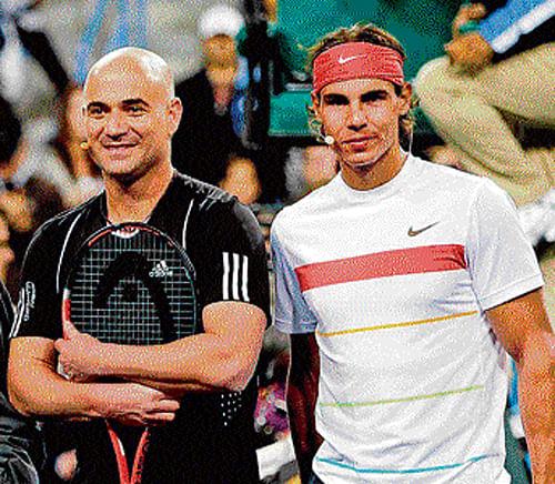 bonding with the best Agassi (left) feels Nadal has done enough in the tough modern era to merit the tag of the finest.