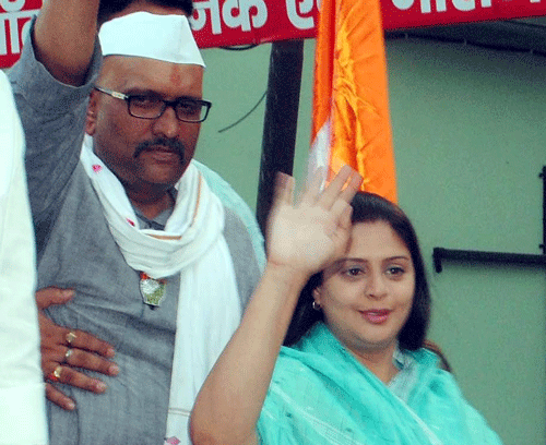 Actress Nagma campaigns with Congress candidate from Varanasi Ajay Rai during a road show . PTI Image