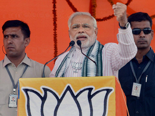 BJP Prime Ministerial candidate Narendra Modi addresses an election rally in Motihari on Friday. PTI Photo