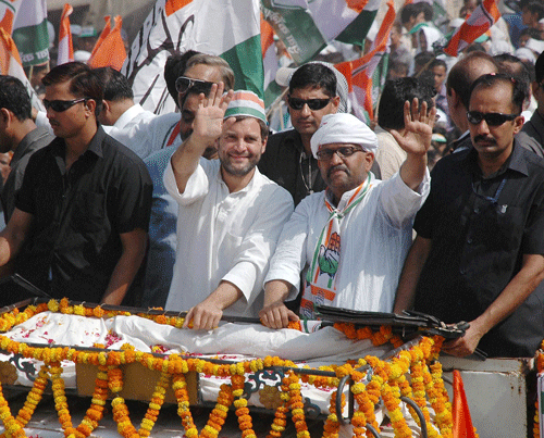 BJP today hit out at the Election Commission for allowing Rahul Gandhi to hold a road show in a Varanasi area where Narendra Modi was refused permission for a rally, saying it was done for "political reasons". AP File Photo