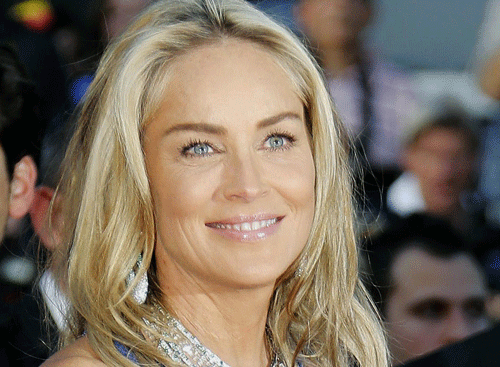 Actress Sharon Stone, who plays a sensual role in her upcoming film ''Fading Gigolo'', says not just Hollywood, everybody is obsessed with sex. Reuters file photo