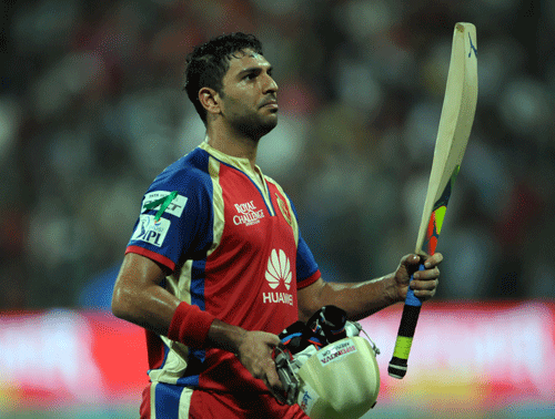 Star batsman Yuvraj Singh smashed a magnificient 68 not out in a stunning six-hitting exhibition to power Royal Challengers Bangalore to a 16-run victory over Delhi Daredevils in an IPL match here today. DH photo