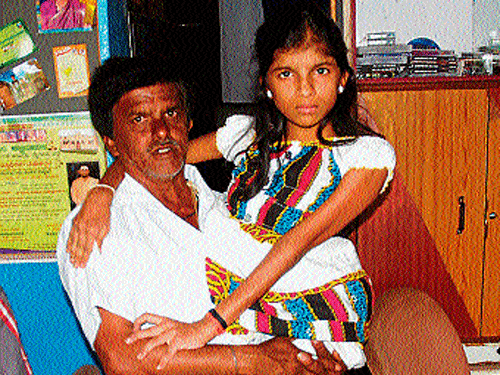Rathnasumana with her father