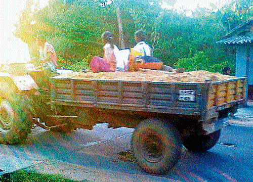 (Left) Sand being transported in a tractor in N R pura. DH photo