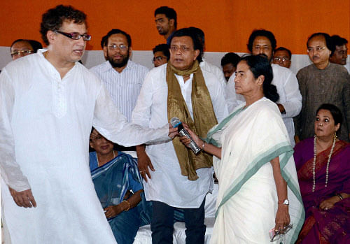 West Bengal Chief Minister and TMC supremo Mamata Banerjee at a meeting of the party's winning candidates in Kolkata on Saturday. Party leaders Derek O Brien and Mithun Chakraborty are also seen. PTI Photo