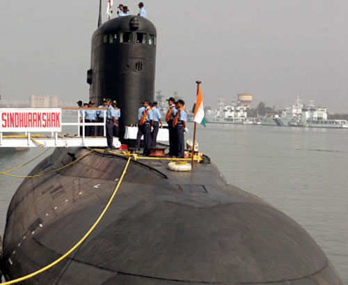 The Indian Navy's Sindhurakshak submarine is docked in Visakhapatnam in this February 13, 2006 file photo. About 18 Indian sailors were trapped after an explosion and fire on board the Sindhurakshak, a conventionally powered Indian submarine, berthed at the coastal city of Mumbai early on August 14, 2013, the navy said. Chief of the Naval Staff Admiral R K Dhowan today said all recent incidents involving assets of the Navy have been thoroughly analysed and all standard operating procedures are being followed.REUTERS