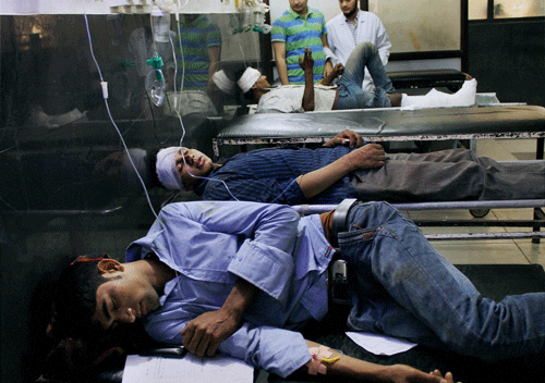Injured passengers at Government Medical College hospital in Jammu on Tuesday after a bus going to the Kashmir valley fell into a deep gorge on the Jammu-Srinagar Highway.PTI Photo