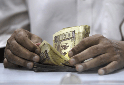Continuing its rise for the fifth straight day, the rupee today edged higher by 5 paise to 58.54 against the US dollar in early trade on sustained capital inflows amidst selling of the American currency by banks. PTI File Photo