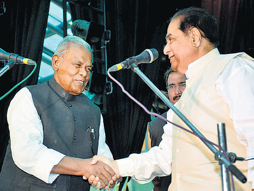 Bihar governor D Y Patil greets new CM Jitan Ram Manjhi  after the oath-taking ceremony in Patna on Tuesday. PTI
