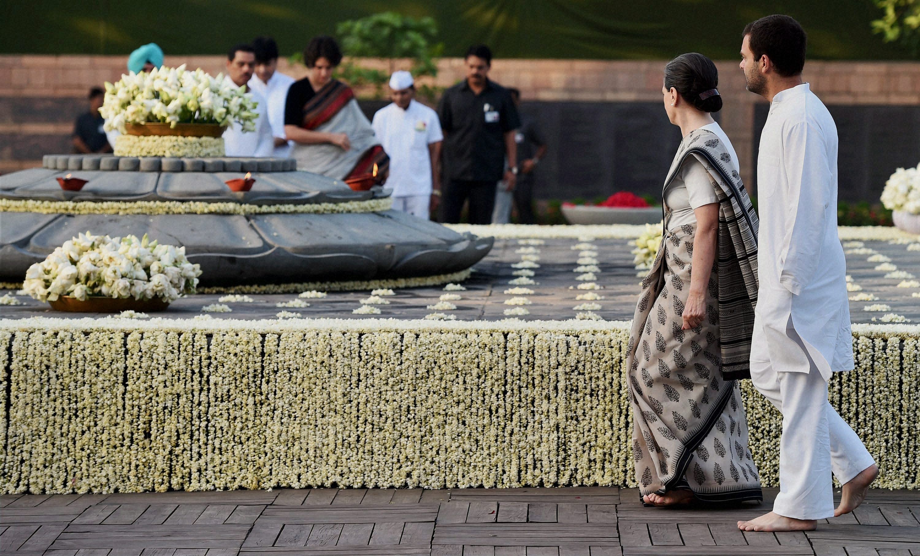 Congress President Sonia Gandhi and party vice president Rahul Gandhi arrive at Vir Bhumi to pay tributes to former Prime Minister Rajiv Gandhi on his 23rd death anniversary in New Delhi on Wednesday. PTI Photo