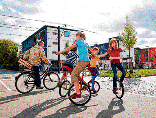 Here, apart from seeing the largest collection of photovoltaic solar roofs and 'passive houses' in one little town, I find car-free streets on which kids play unhampered and cyclists and pedestrians are king.  DH photo