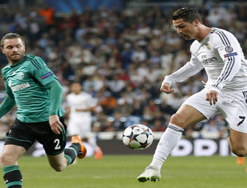 Cristiano Ronaldo became the first player in the 59-year history of the European Cup to score for two different winning teams when he netted Real Madrid's fourth goal in their 4-1 win over Atletico Madrid on Saturday. Reuters photo