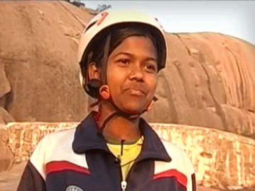 Malavath Purna along with 16-year-old Sadhanapalli Anand achieved the historic feat, according to information reaching social welfare department here. After a 52-day-long expedition, the duo pitched the national flag and the picture of B.R. Ambedkar, the architect of India's constitution, atop the world's highest peak. Screen grab