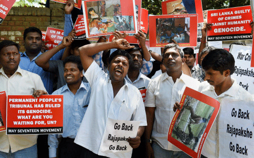 : Members of Delhi Tamil Youth Forum stage a protest against Sri Lankan President Mahinda Rajapaksa's visit to India, in New Delhi.PTI Photo