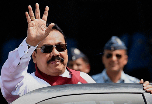 Sri Lankan President Mahinda Rajapaksa arrives at AFS Palam to attend the swearing-in ceremony of Narendra Modi as Prime Minister, in New Delhi on Monday. PTI Photo