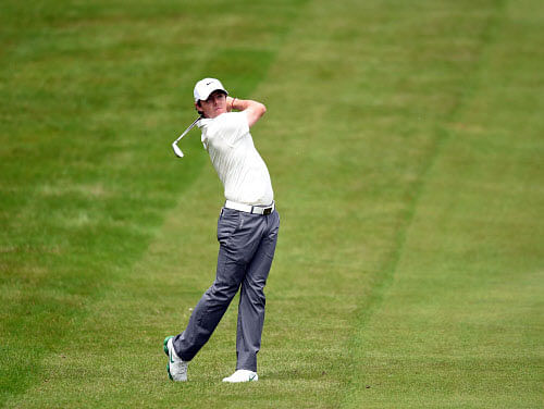 World number 10 Rory McIlroy was pinching himself after ending one of the most turbulent weeks of his life by winning the BMW PGA Championship at Wentworth on Sunday.  AP file photo