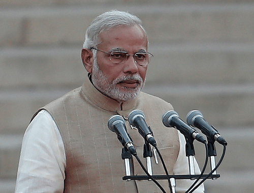 Prime Minister Narendra Modi, who was sworn in Monday, formally assumde charge of his office Tuesday. Reuters